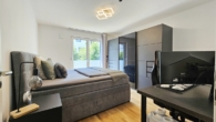 Schlafzimmer - Helle 2-Zimmer-EG-Wohnung in Top-Wohnlage mit Terrasse, Garten und TG-Stellplatz!